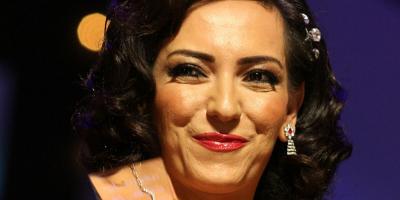 أمل عرفة تحتفل بـ16 عامًا من الأمومة