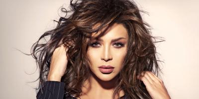 أمل بوشوشة مع شقيقتها.. هل تشبهها؟