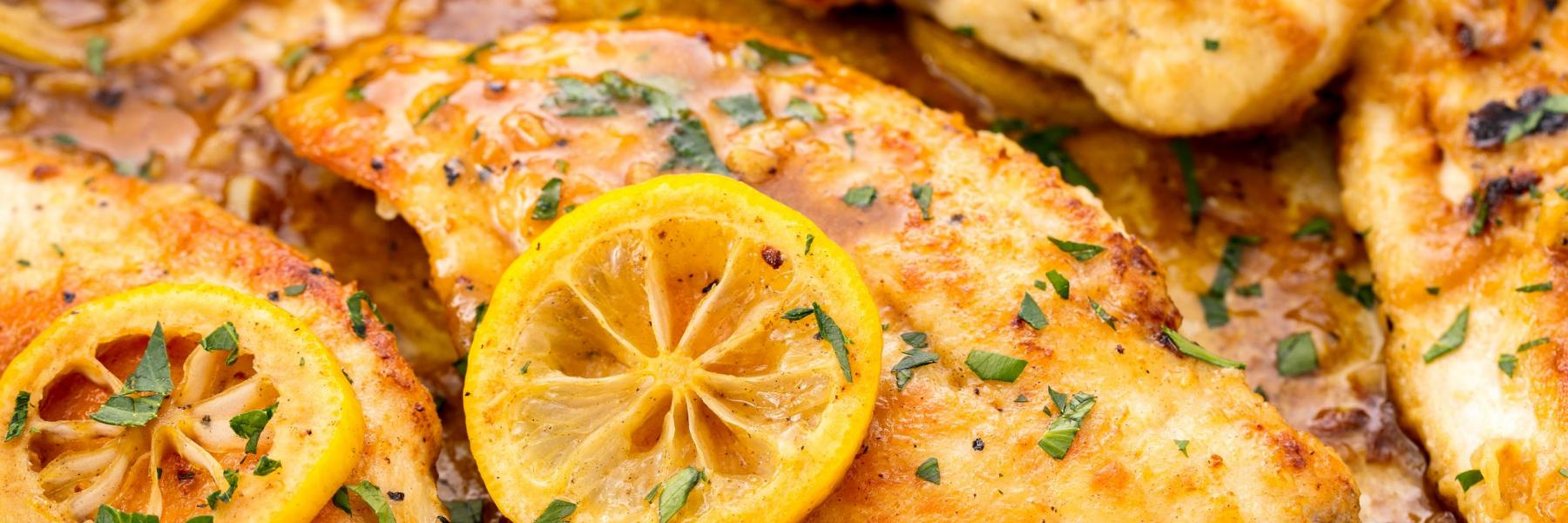 صينية الدجاج بالبطاطس والثوم والليمون