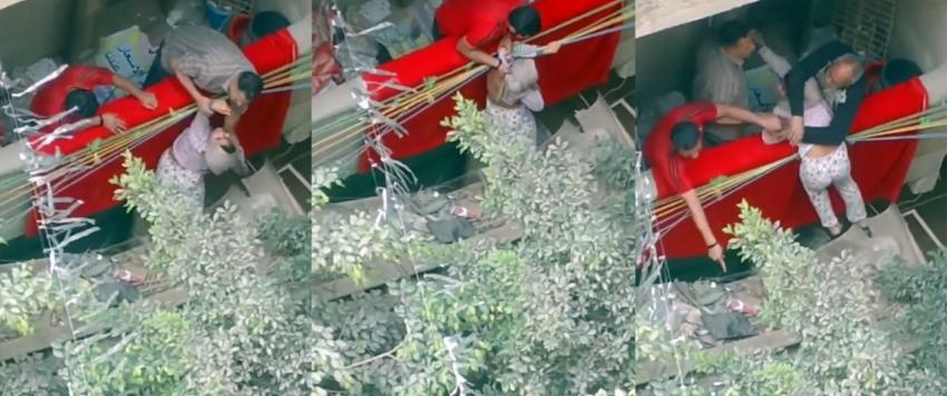 أب يحاول القاء ابنته المراهقة من البلكونة بهدف تربيتها