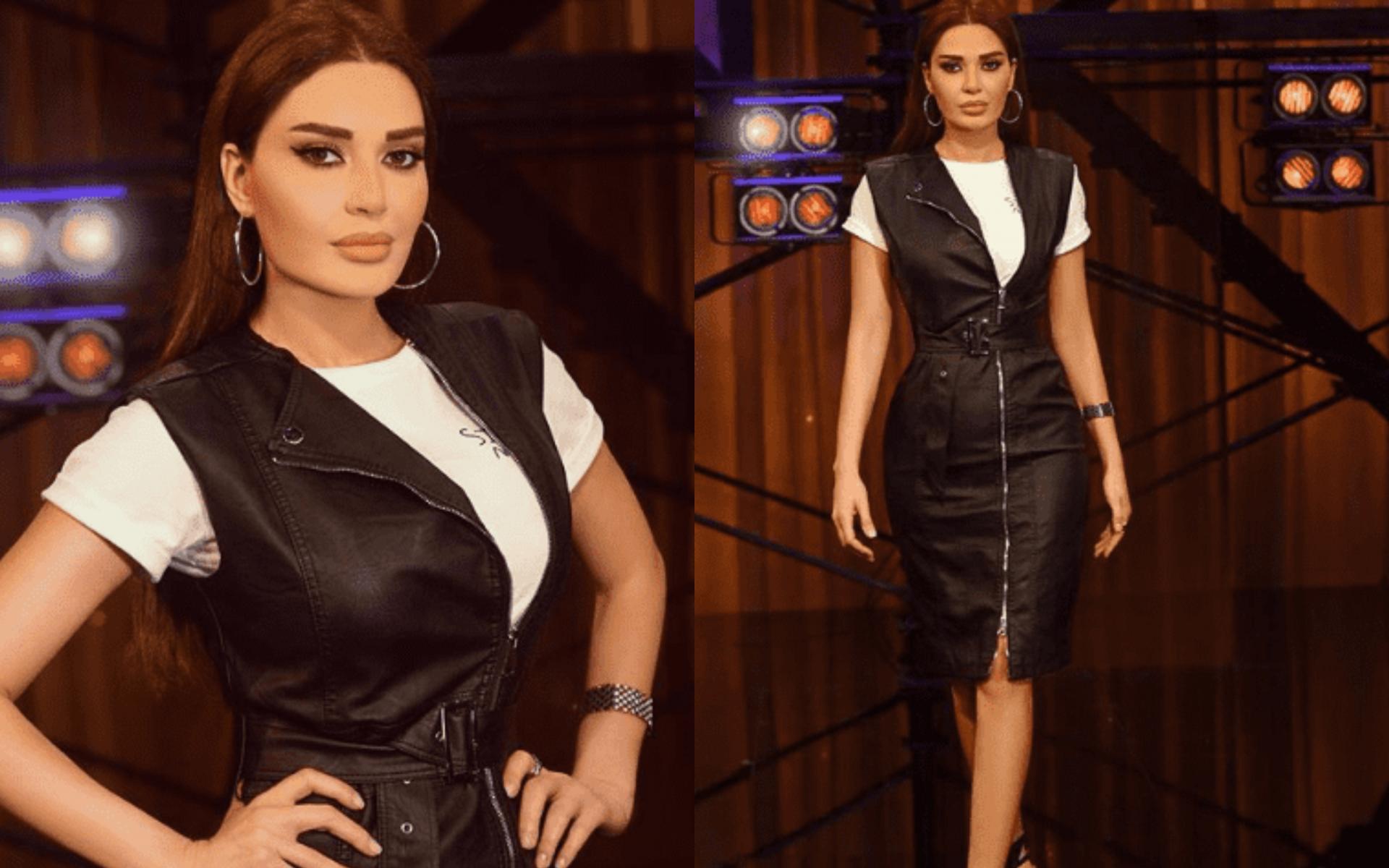 إطلالة جريئة وقوية بجاكيت طويل من الجلد