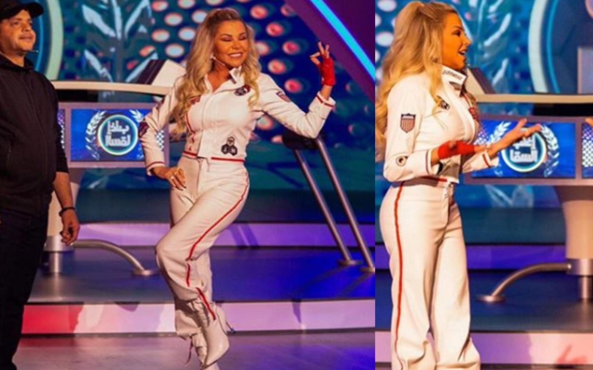 رزان تختار توب وبنطلون باللون الأبيض ونسقت معه حذاء أبيض