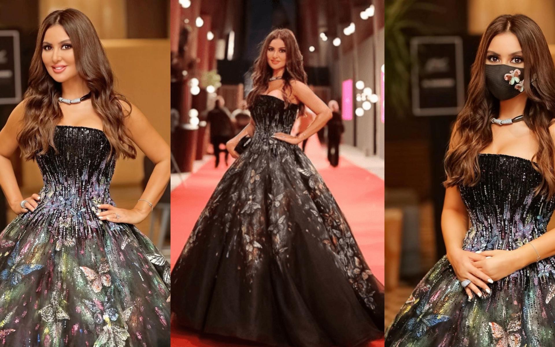 تألقت ميساء مغربي بفستان أسود منفوش مزين بالفراشات وكمامة من نفس قماشة الفستان