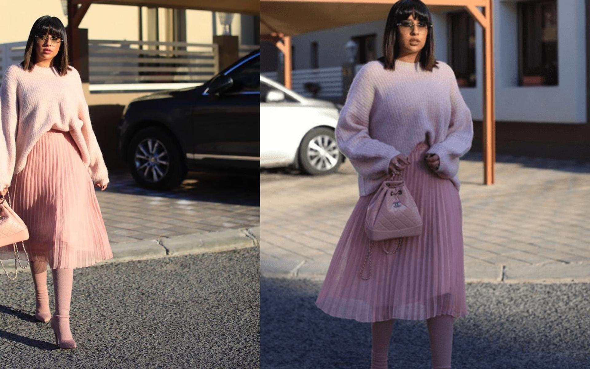 توب شتوي باللون الزهري نسقته فرح مع تنورة من نفس اللون وارتدت أسفل التنورة جوارب طويلة مع حذاء بكعب